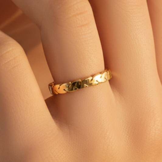 Braided gold ring romantic shot - hand touching face