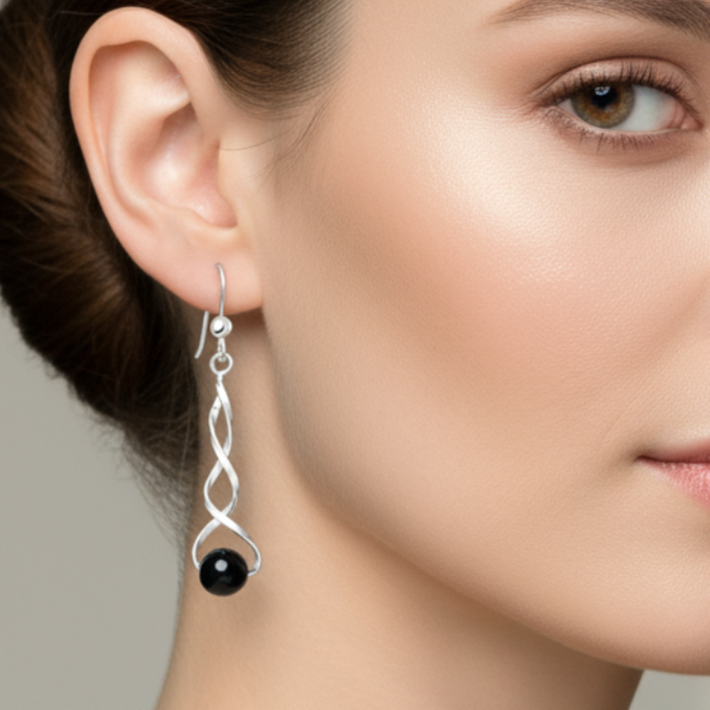 Model wearing sterling silver earrings
