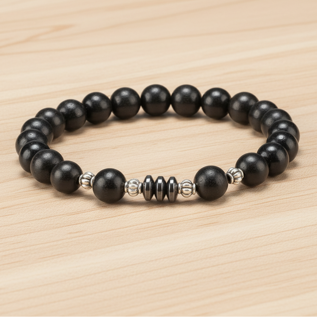 Black Wood Hematite Bracelet - Light Wood Flat Lay