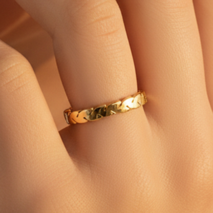 Braided gold ring romantic shot - hand touching face
