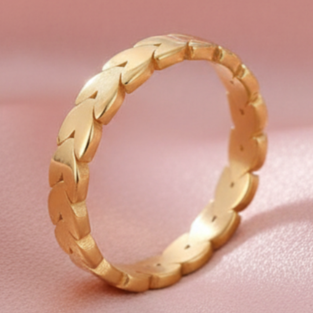 Braided ring on blush pink satin