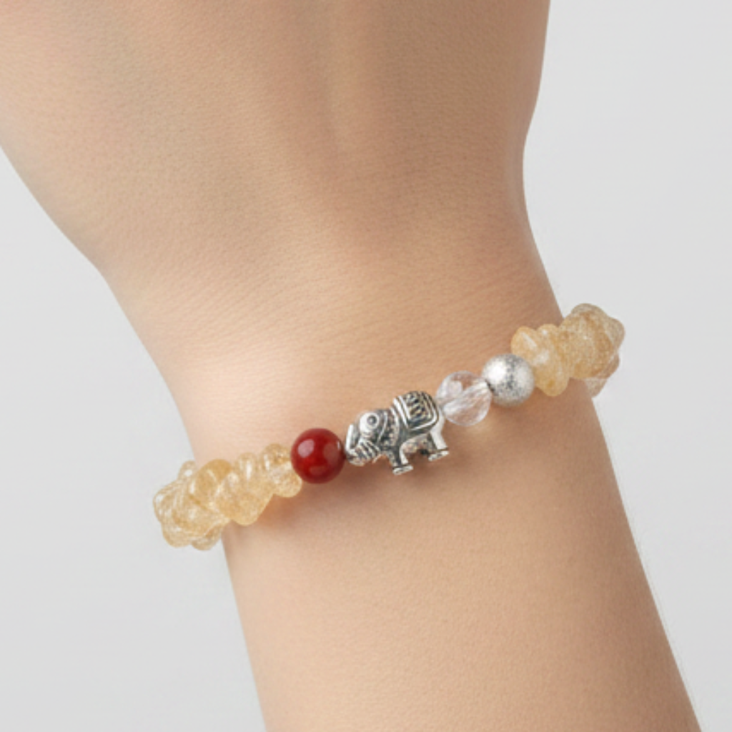 Citrine bracelet on model hand with minimalist background