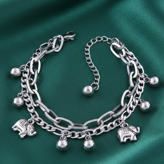 Elephant charm bracelet on emerald green satin