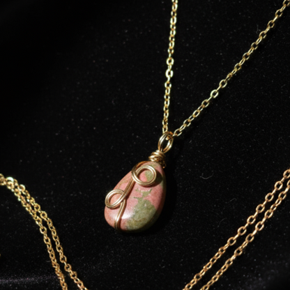 Gemstone pendant on black velvet