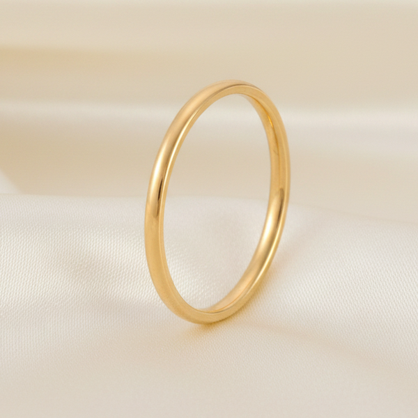 Gold Band Ring on Cream Satin