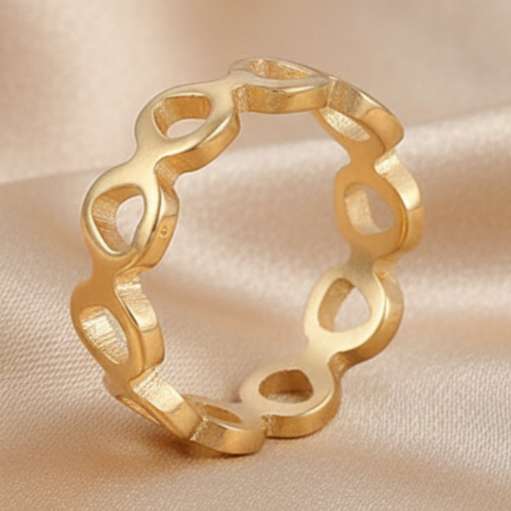 Gold Heart Ring – Champagne Satin Background