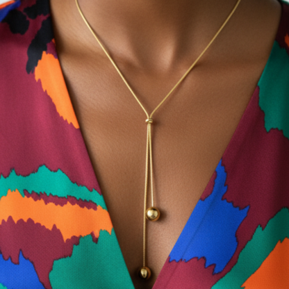 Gold Lariat Necklace on Afro Model