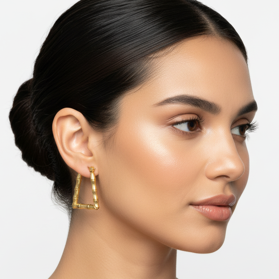 Latina model with gold trapezoid bamboo earrings