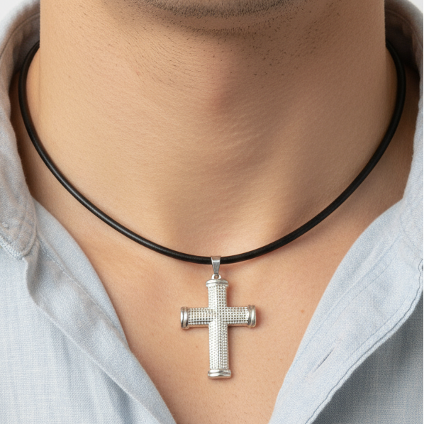 Male torso wearing silver cross necklace