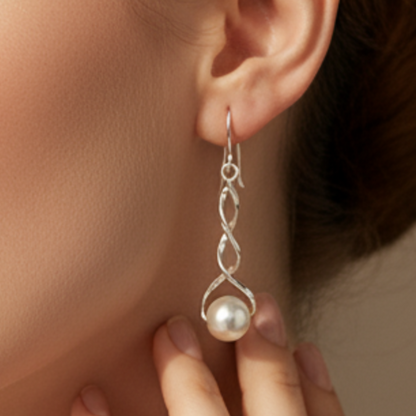 Model wearing pearl earrings