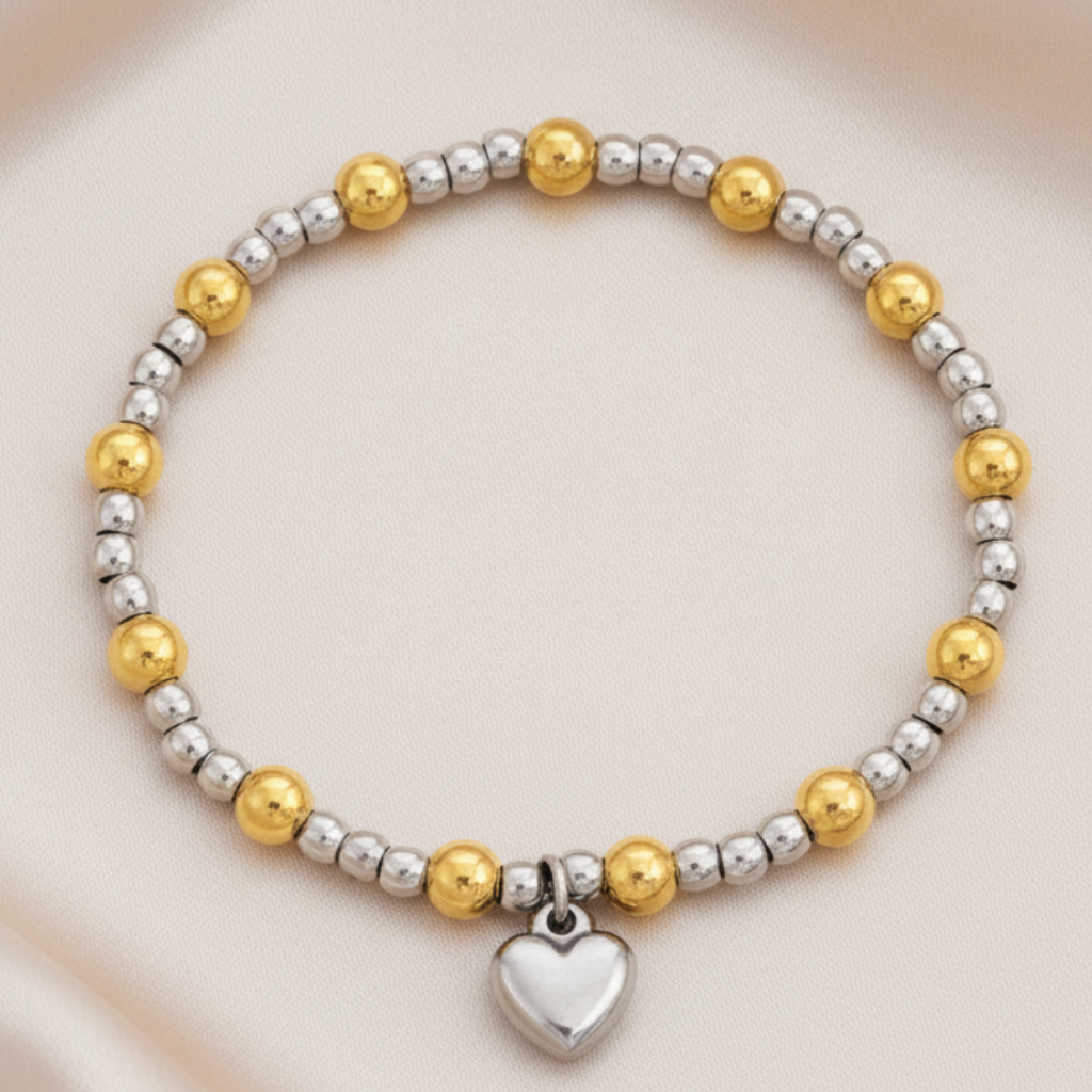 Pulsera corazón - fondo satinado champagne