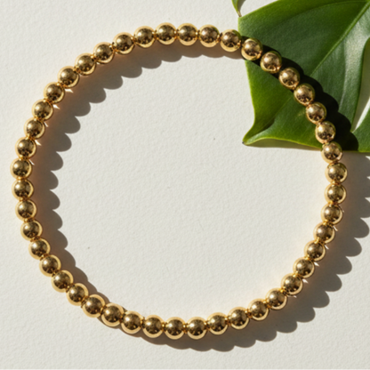 Pulsera dorada - fondo naturaleza minimalista