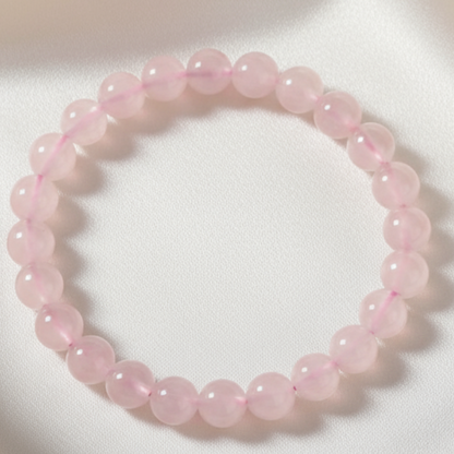 Rose Quartz Bracelet on Satin Background
