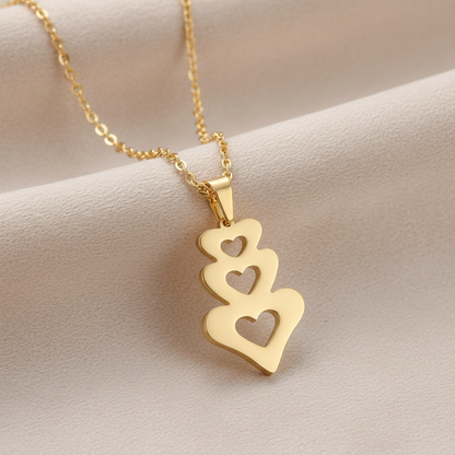Triple Heart Necklace Close-up – Light Beige